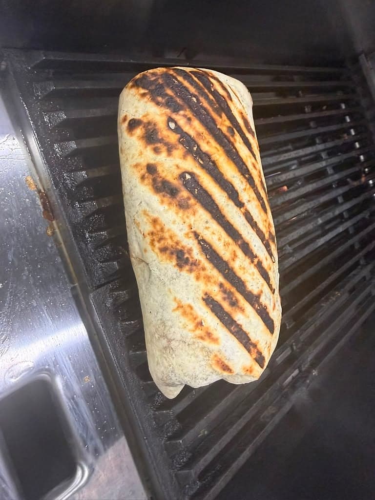 Burrito grilling with char marks
